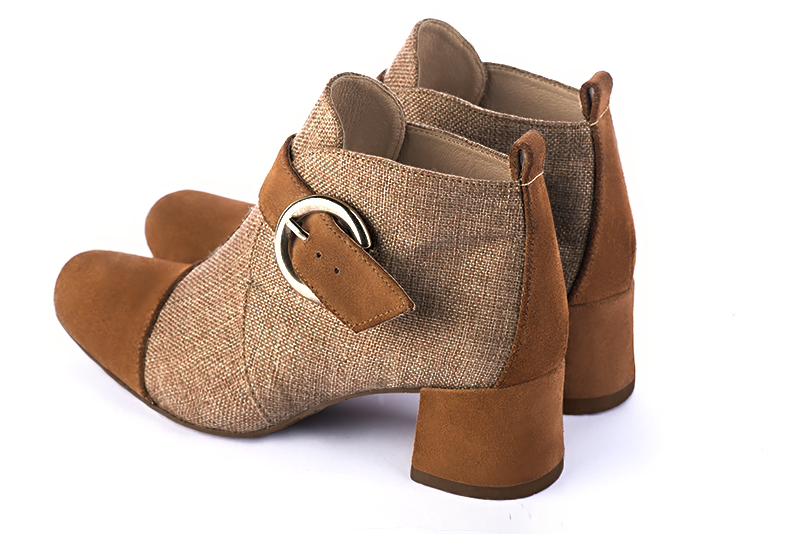 Caramel brown women's ankle boots with buckles at the front. Round toe. Low flare heels. Rear view - Florence KOOIJMAN